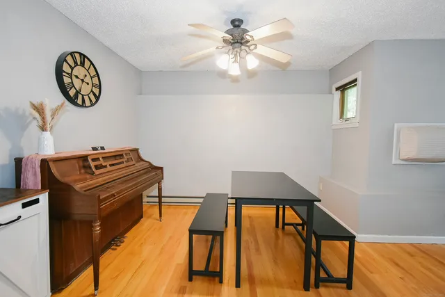 a view of a workspace with furniture
