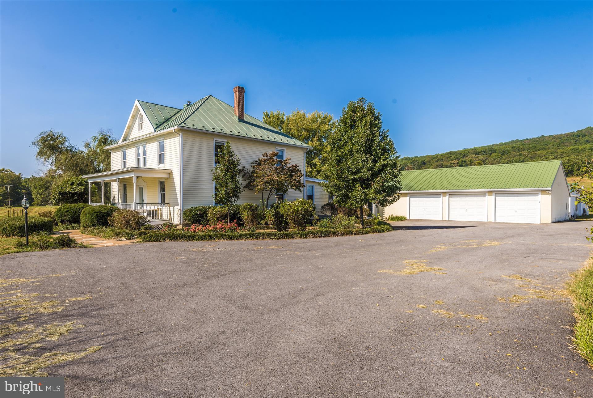 9542 Bethel Road Frederick, MD 21702 - Photo 21 of 30 Side of house, large parking pad, detached garage