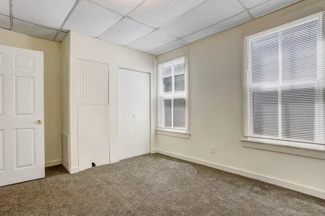 an empty room with windows