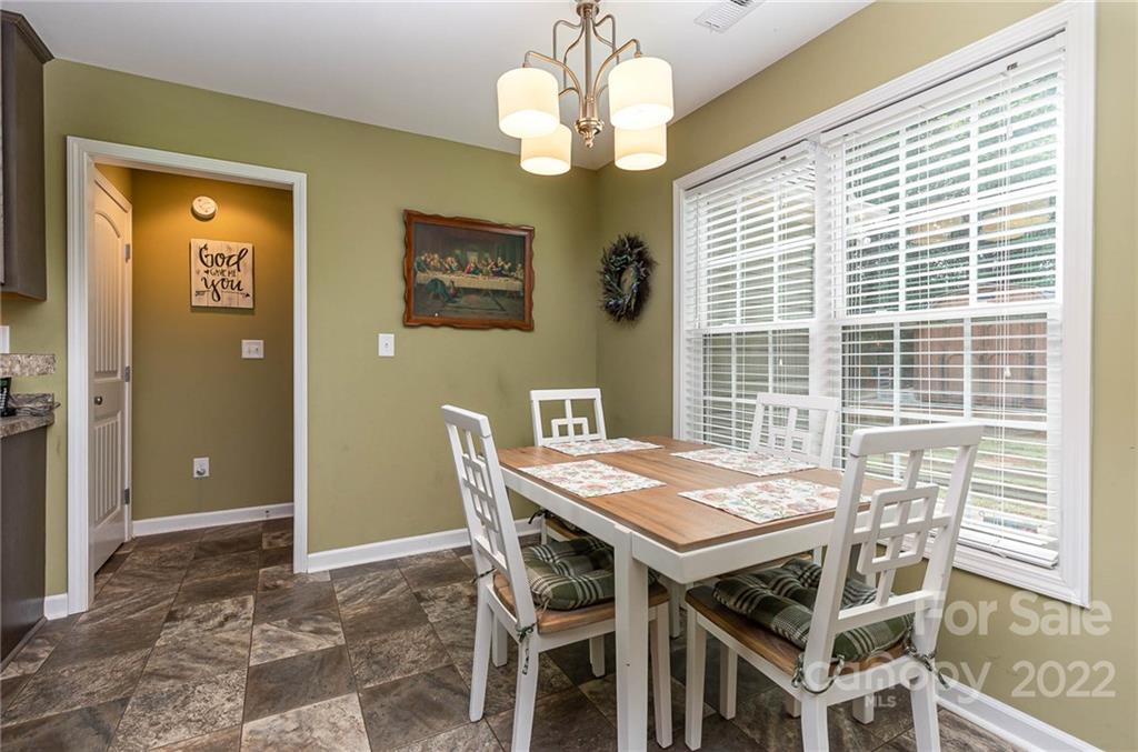 155 Rose Brier Lane. Salisbury, NC 28146 - Photo 12 of 32 a view of a dining room with furniture and window