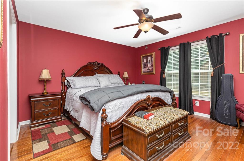 155 Rose Brier Lane. Salisbury, NC 28146 - Photo 13 of 32 a bedroom with a bed and a flat screen tv