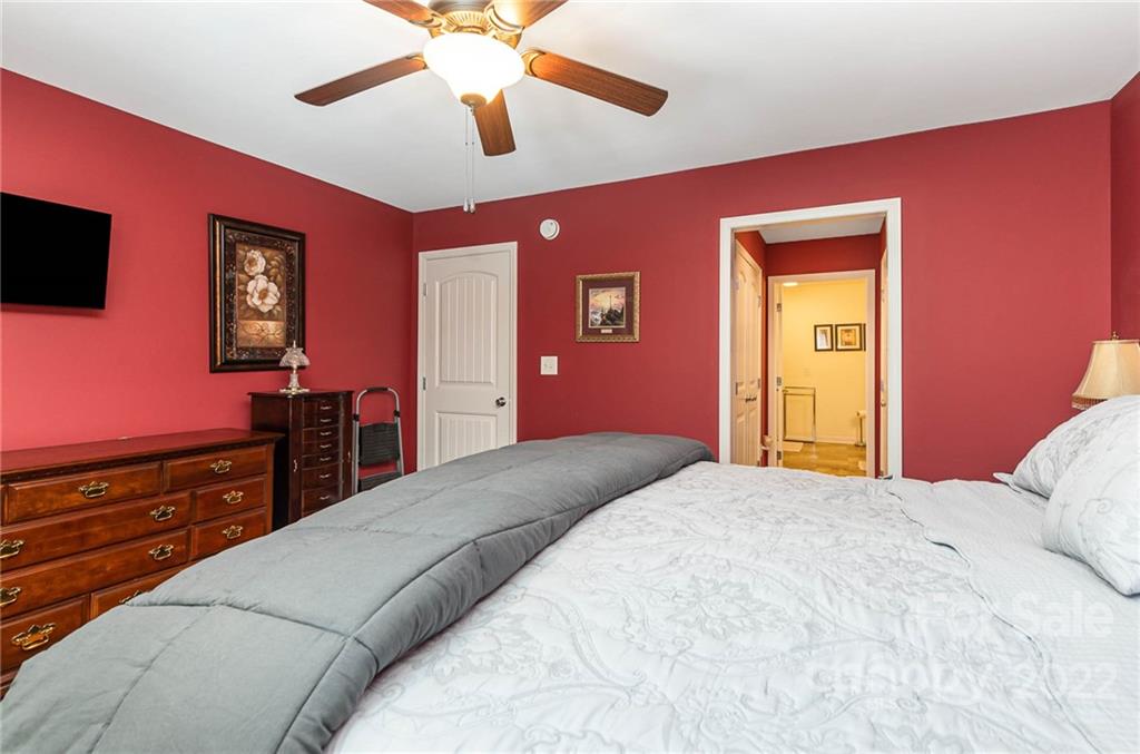 155 Rose Brier Lane. Salisbury, NC 28146 - Photo 15 of 32 a bedroom with a bed and a dresser