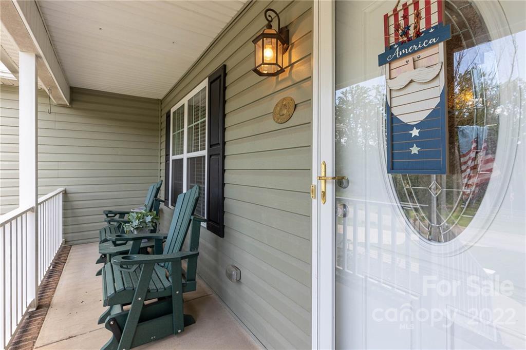 155 Rose Brier Lane. Salisbury, NC 28146 - Photo 2 of 32 a view of a door with chair and table
