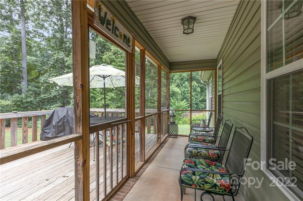 155 Rose Brier Lane. Salisbury, NC 28146 - Photo 23 of 32 a view of two chairs in the balcony