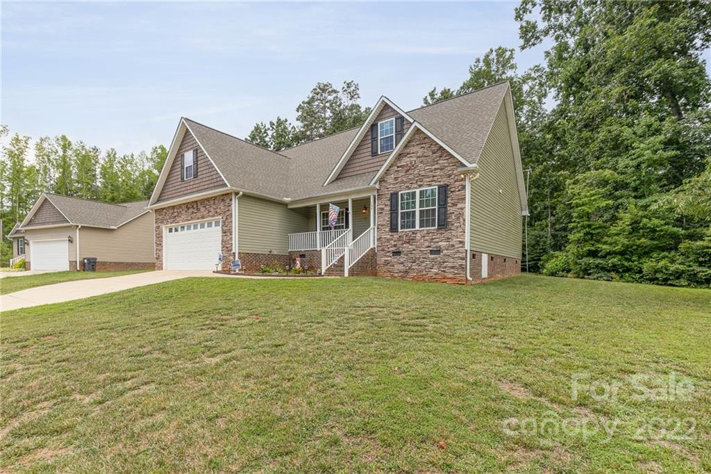 155 Rose Brier Lane. Salisbury, NC 28146 - Photo 26 of 32 a view of a house with a backyard