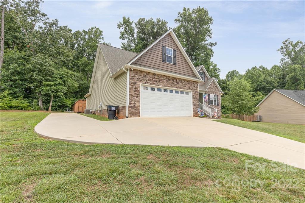 155 Rose Brier Lane. Salisbury, NC 28146 - Photo 27 of 32 a view of a house with a yard