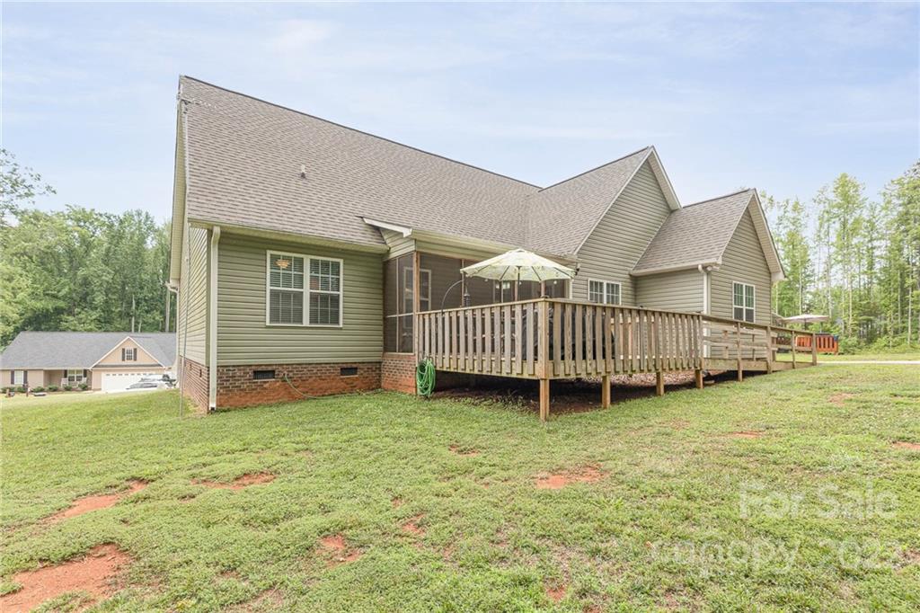 155 Rose Brier Lane. Salisbury, NC 28146 - Photo 30 of 32 a view of a house with yard and deck
