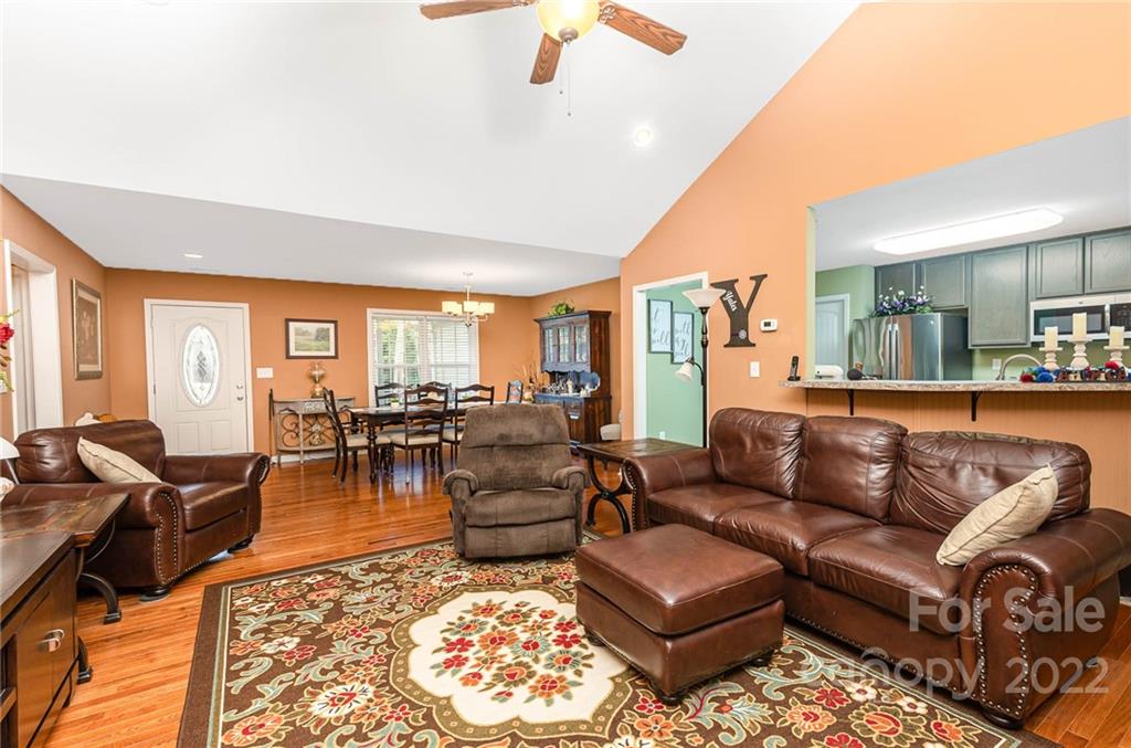 155 Rose Brier Lane. Salisbury, NC 28146 - Photo 7 of 32 a living room with furniture kitchen view and large windows