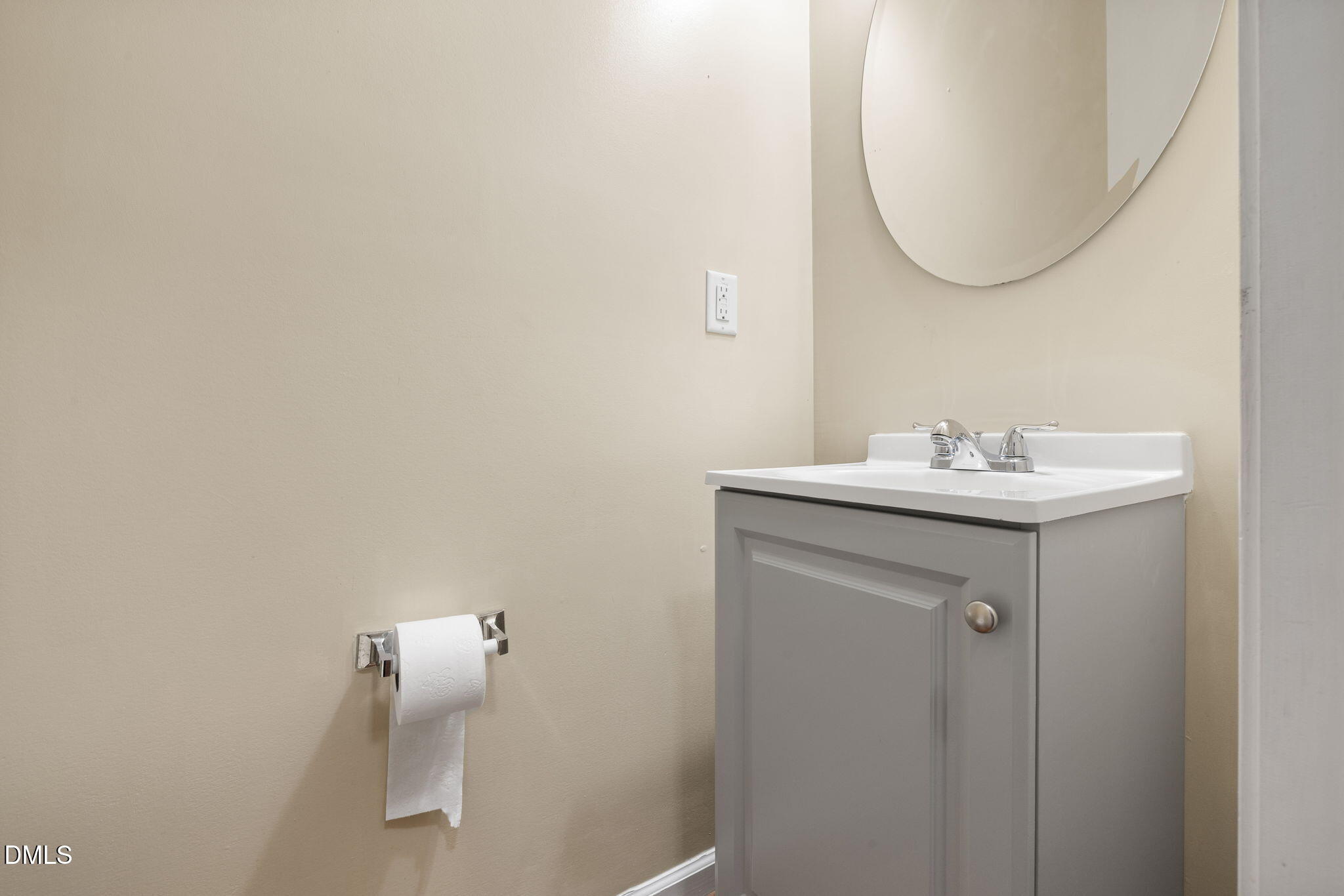 401 Coalinga Lane, Unit 108 Raleigh, NC 27610 - Photo 11 of 28 a bathroom with a sink and a mirror