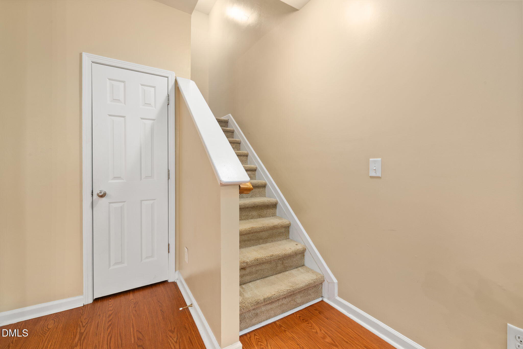 401 Coalinga Lane, Unit 108 Raleigh, NC 27610 - Photo 12 of 28 a view of a hallway with staircase