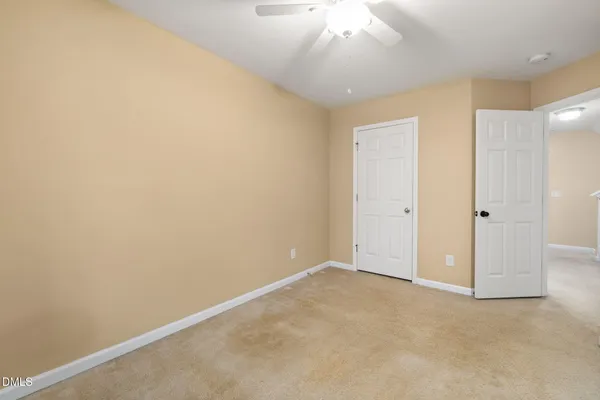 an empty room with a bathroom