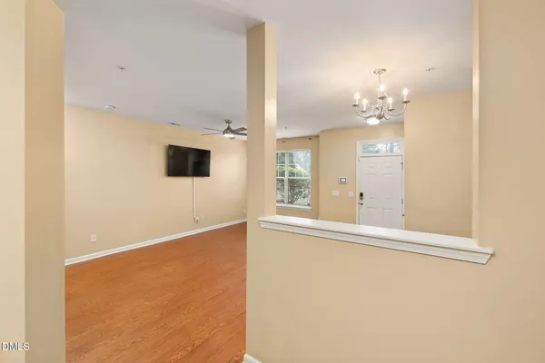 a view of a livingroom with a kitchen