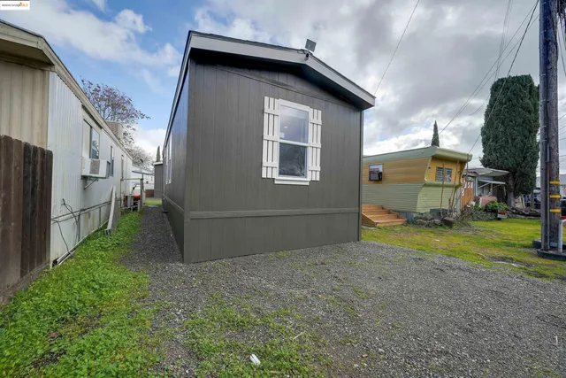 a house view with a backyard space