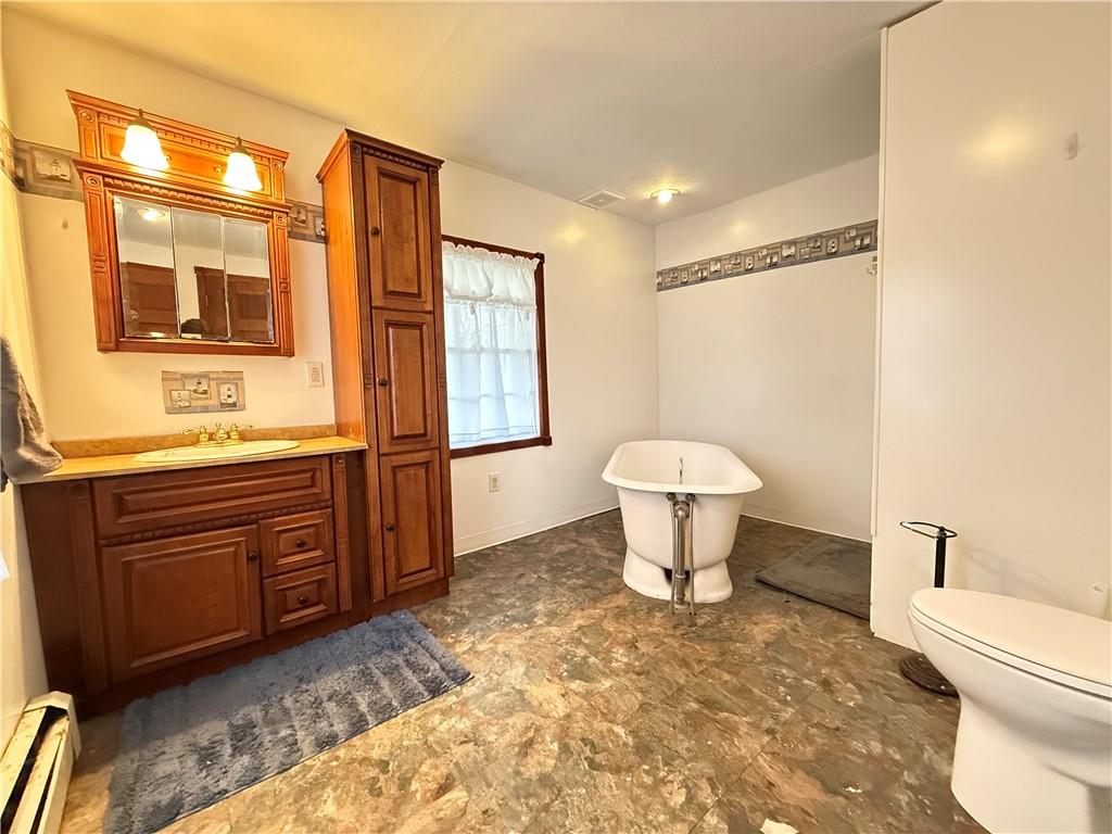 1173 Fredonia Road Hadley, PA 16130 - Photo 36 of 49 a bathroom with a sink toilet and shower