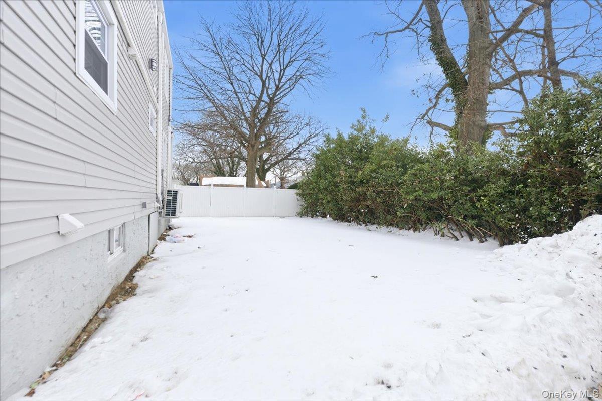 66 Elm Street Valley Stream, NY 11580 - Photo 21 of 23 a view of a backyard of the house