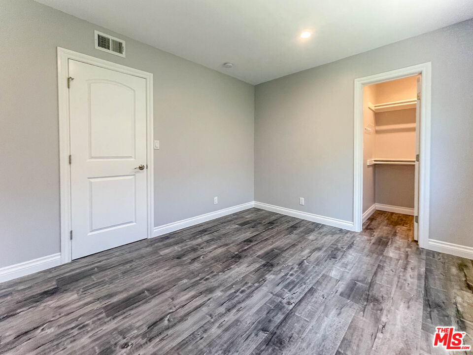 3824 Surfwood Road Malibu, CA 90265 - Photo 18 of 36 a view of empty room with wooden floor