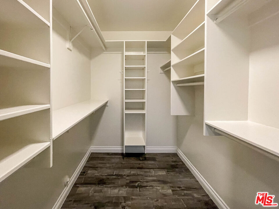 3824 Surfwood Road Malibu, CA 90265 - Photo 31 of 36 a view of walk in closet with empty racks