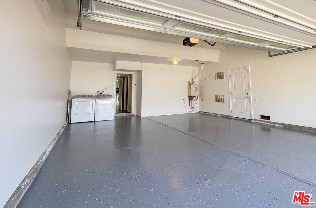 3824 Surfwood Road Malibu, CA 90265 - Photo 32 of 36 a view of a livingroom with wooden floor