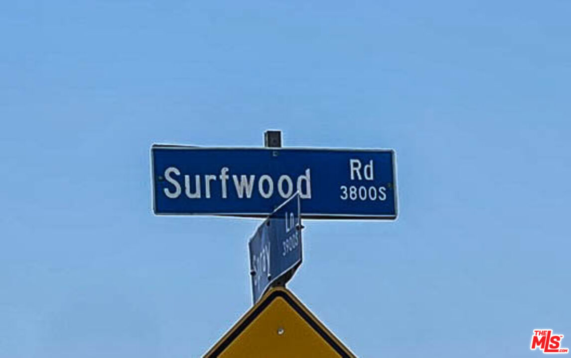 3824 Surfwood Road Malibu, CA 90265 - Photo 36 of 36 a street sign on a wall
