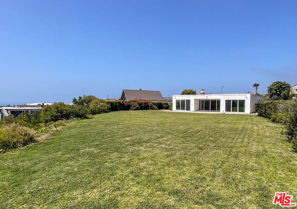3824 Surfwood Road Malibu, CA 90265 - Photo 4 of 36 a house with a garden