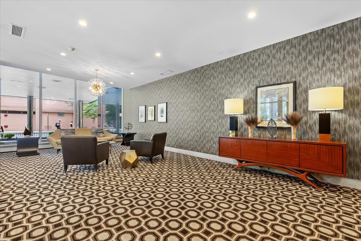 850 North Dewitt Place, Unit 7F Chicago, IL 60611 - Photo 12 of 13 a living room with furniture