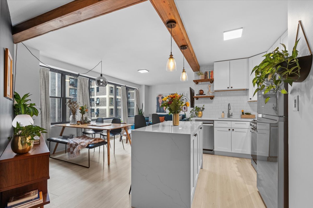 850 North Dewitt Place, Unit 7F Chicago, IL 60611 - Photo 2 of 13 a living room with furniture a potted plant and kitchen view