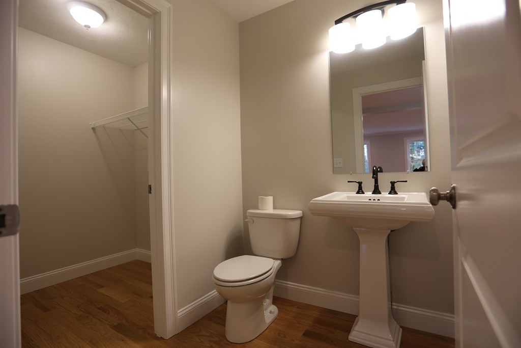 Lot 6 Littleton Road Ayer, MA 01432 - Photo 5 of 11 a bathroom with a toilet sink and mirror