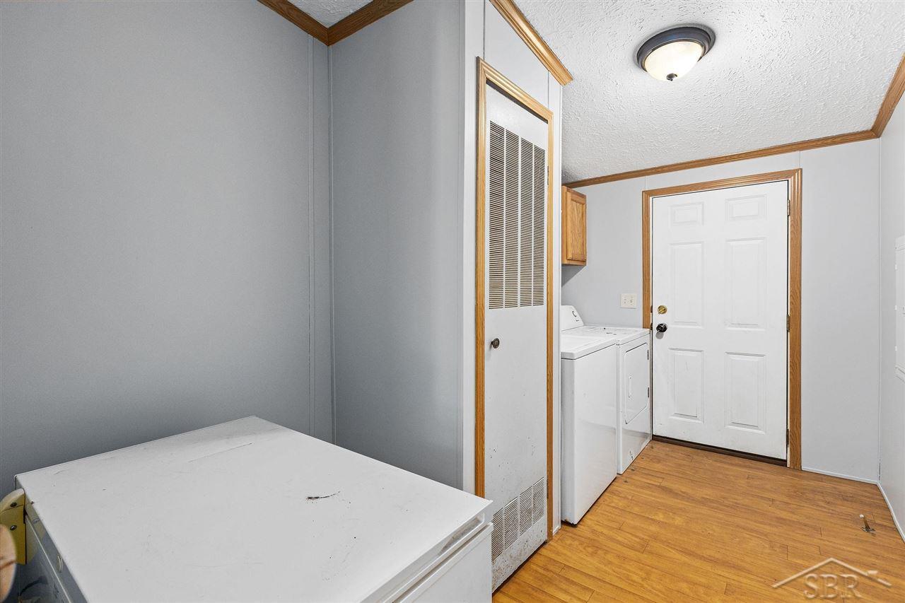 8093 South Iva Road St. Charles, MI 48655 - Photo 14 of 27 Laundry room