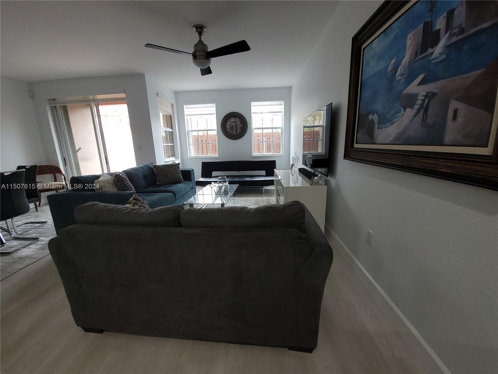 293 Las Brisas Circle Sunrise, FL 33326 - Photo 15 of 69 a living room with furniture and a window