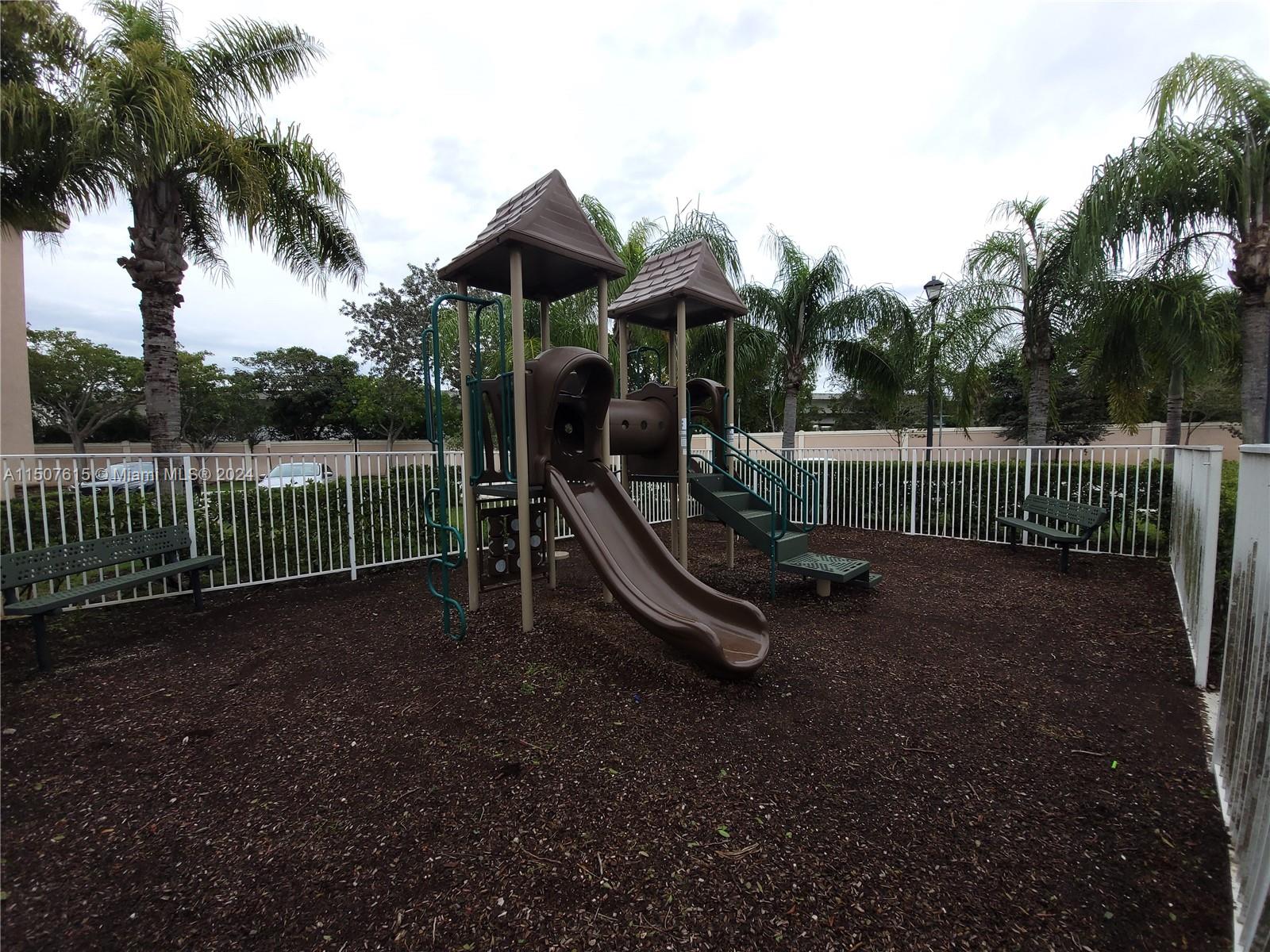 293 Las Brisas Circle Sunrise, FL 33326 - Photo 63 of 69 a view of a park with slide