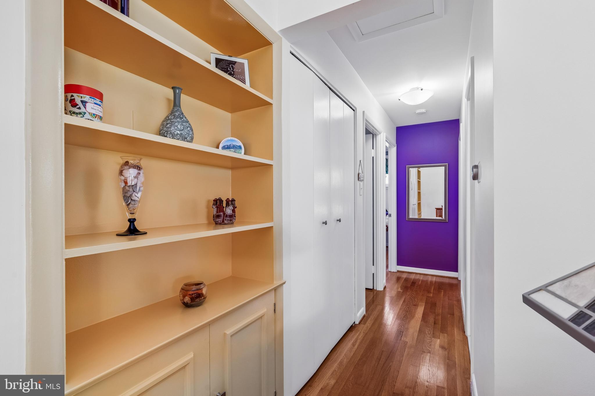 11728 Lovejoy Street Silver Spring, MD 20902 - Photo 6 of 43 Hallway. Built-in shelves, accent wall!