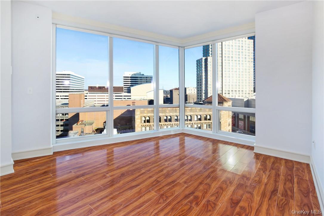 1 Renaissance Square, Unit 11G White Plains, NY 10601 - Photo 14 of 23 a view of a kitchen with wooden floor