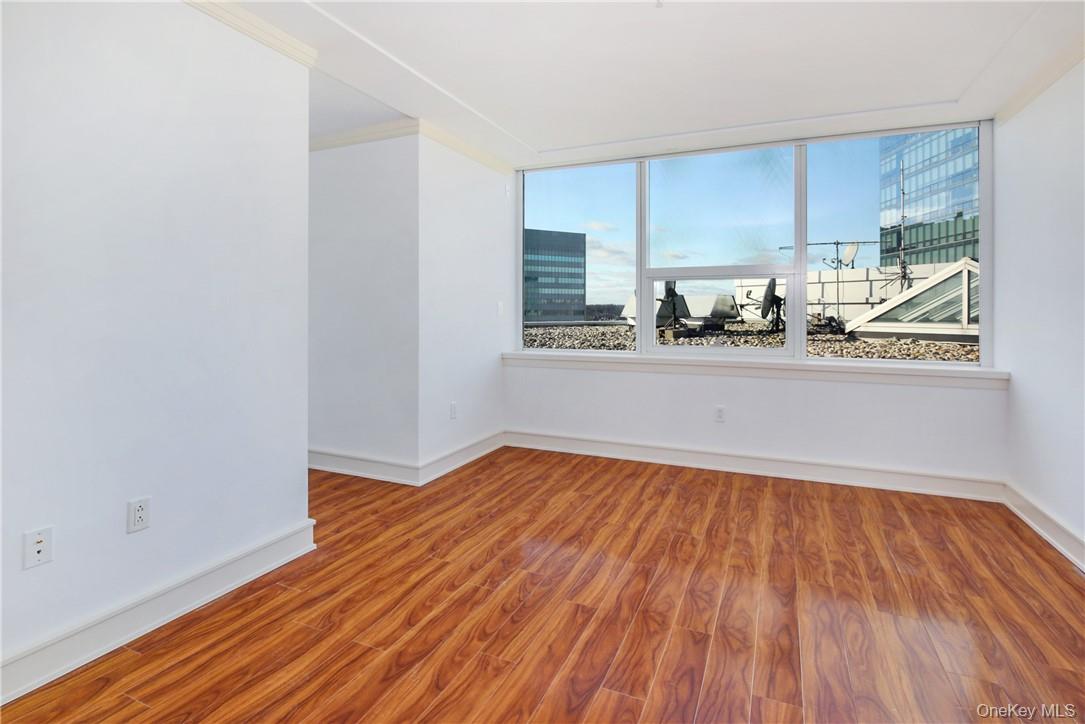 1 Renaissance Square, Unit 11G White Plains, NY 10601 - Photo 16 of 23 a view of a kitchen with wooden floor and a window