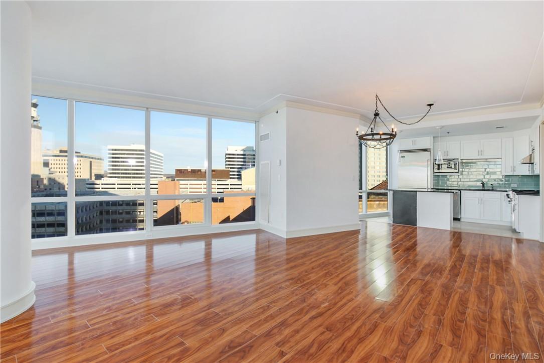 1 Renaissance Square, Unit 11G White Plains, NY 10601 - Photo 2 of 23 a view of a kitchen with wooden floor