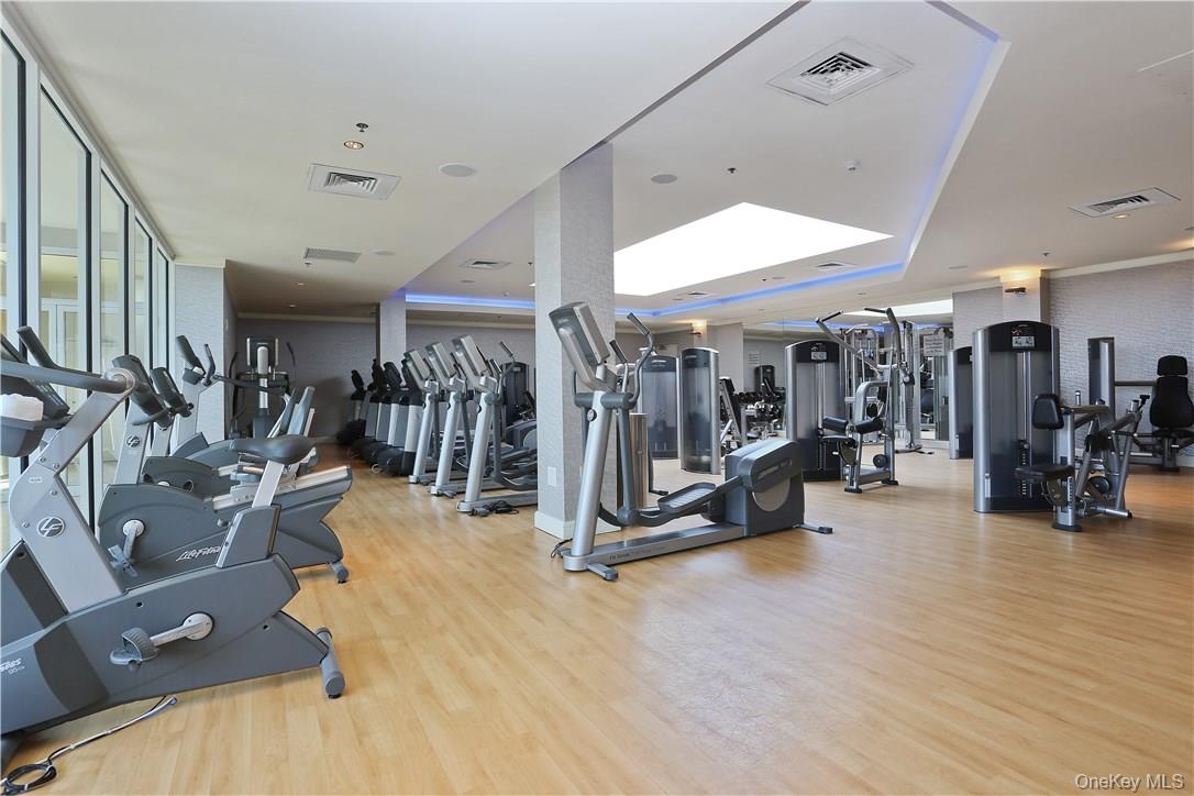 1 Renaissance Square, Unit 11G White Plains, NY 10601 - Photo 21 of 23 a view of a room with gym equipment