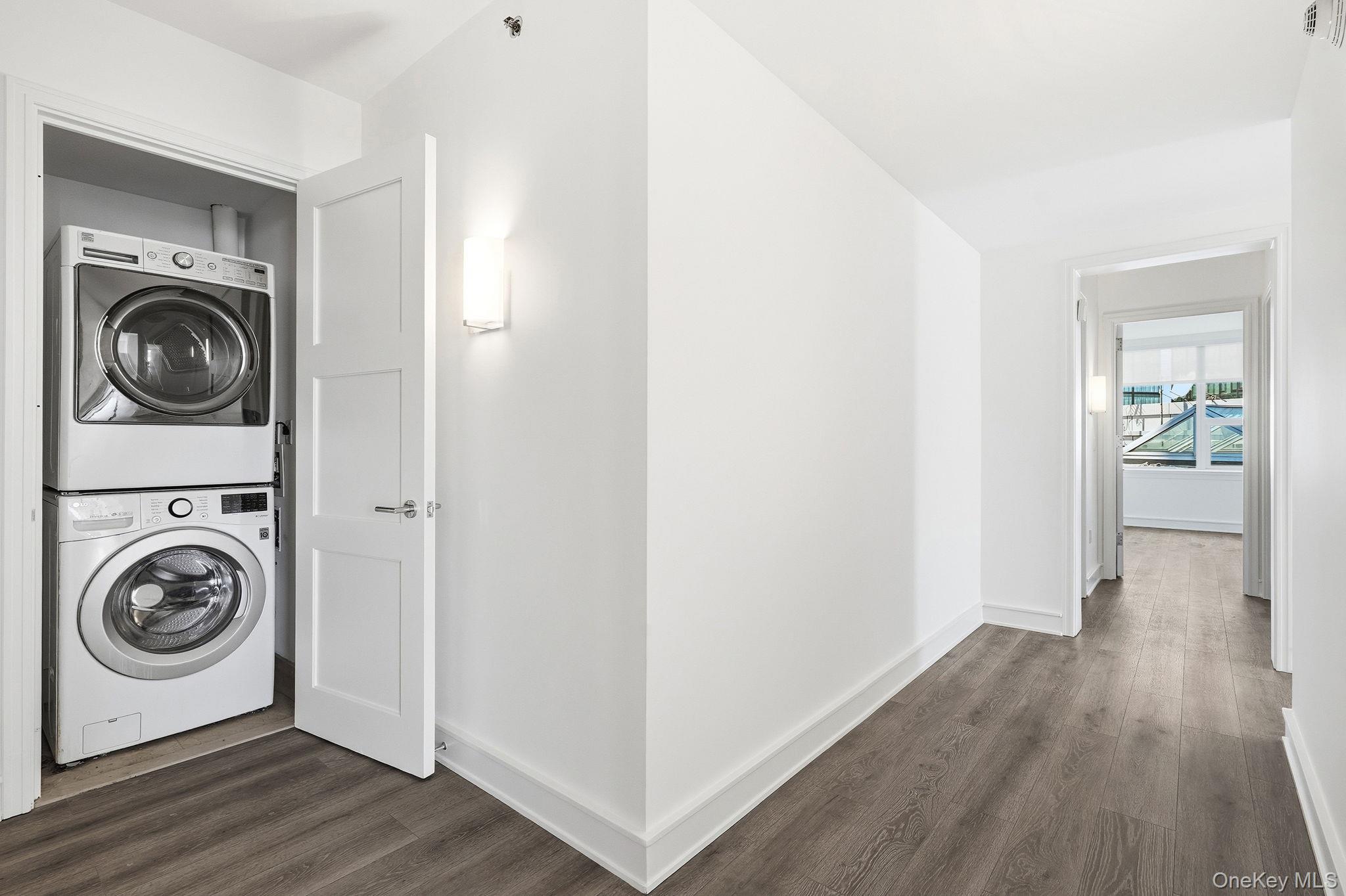 1 Renaissance Square, Unit 11G White Plains, NY 10601 - Photo 23 of 28 a view of washer and dryer in a utility room