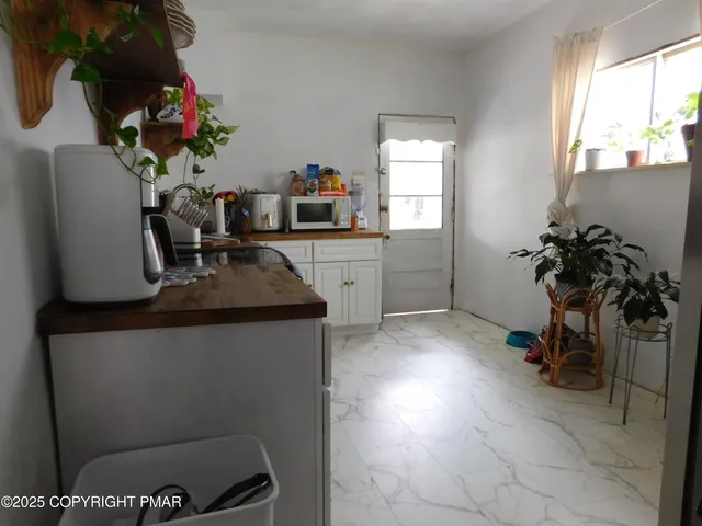 a kitchen with a sink and a stove