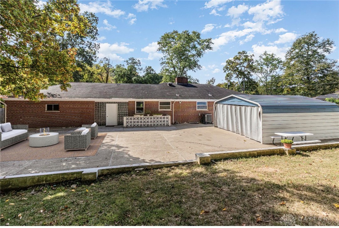 7716-7718 Forest Road Cincinnati, OH 45255 - Photo 24 of 47 Backyard patio and large covered carport