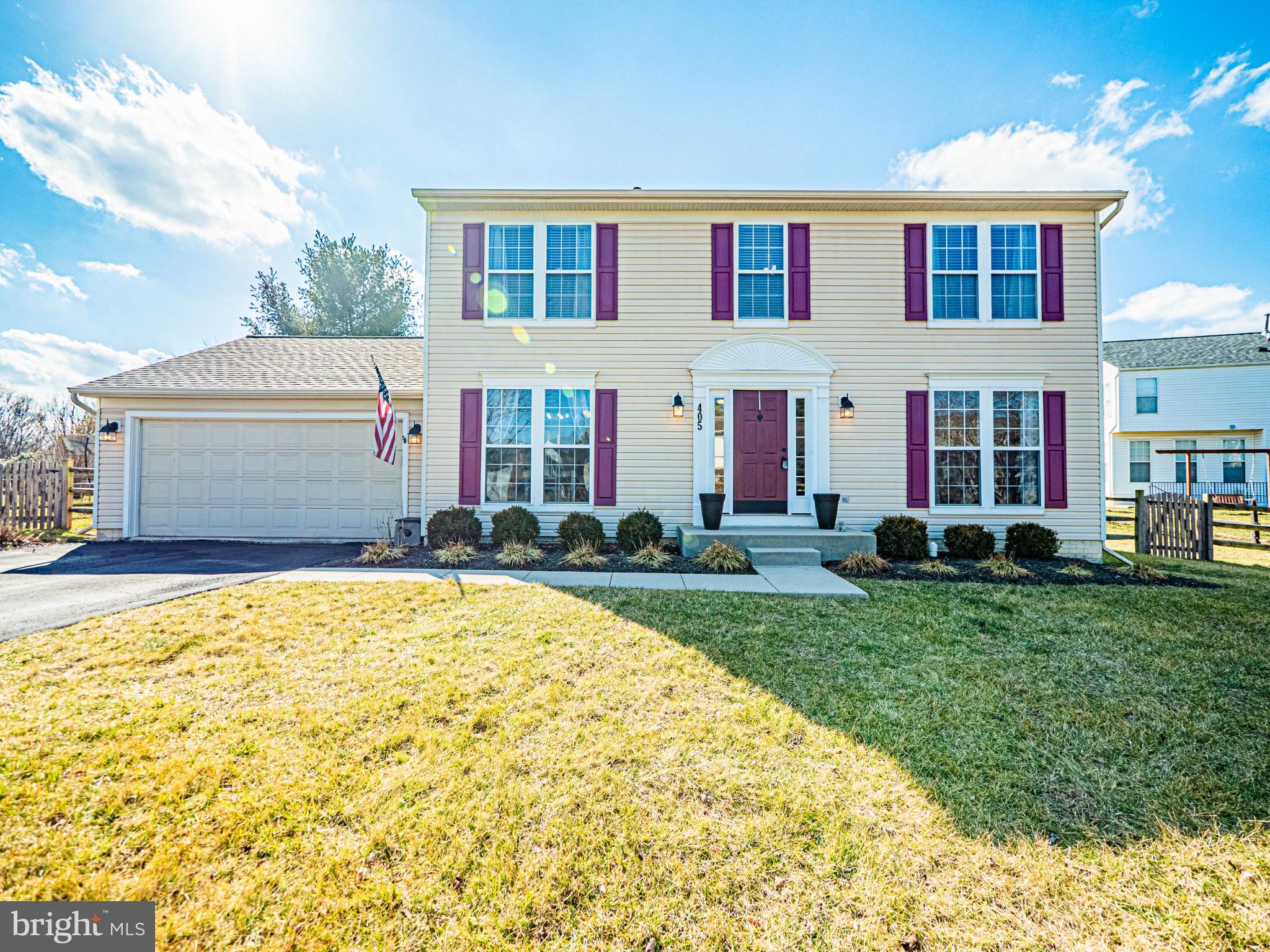 405 McClellan Drive Frederick, MD 21702 - Photo 1 of 39 a front view of a house with a yard and garage