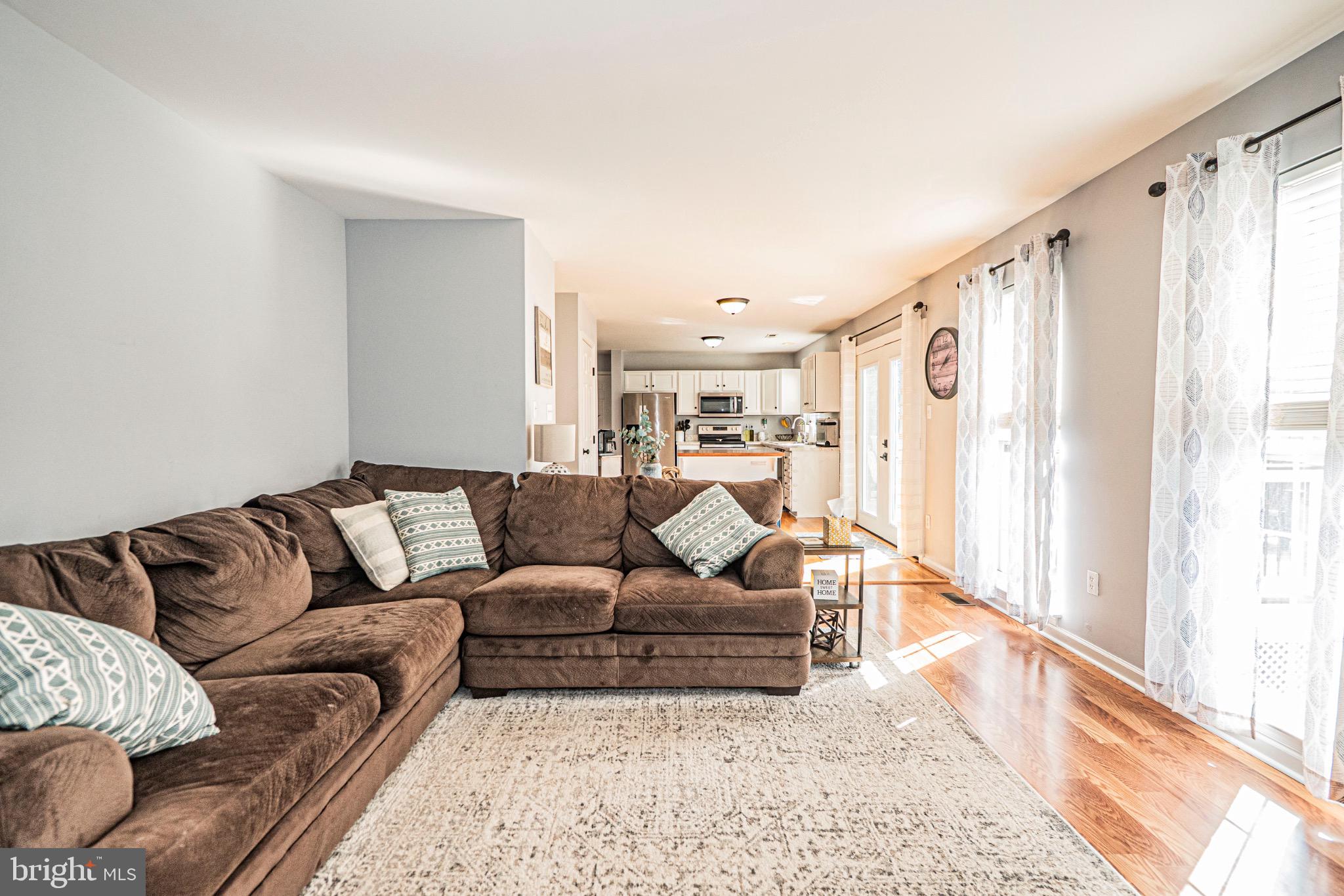 405 McClellan Drive Frederick, MD 21702 - Photo 23 of 39 a living room with furniture and a large window
