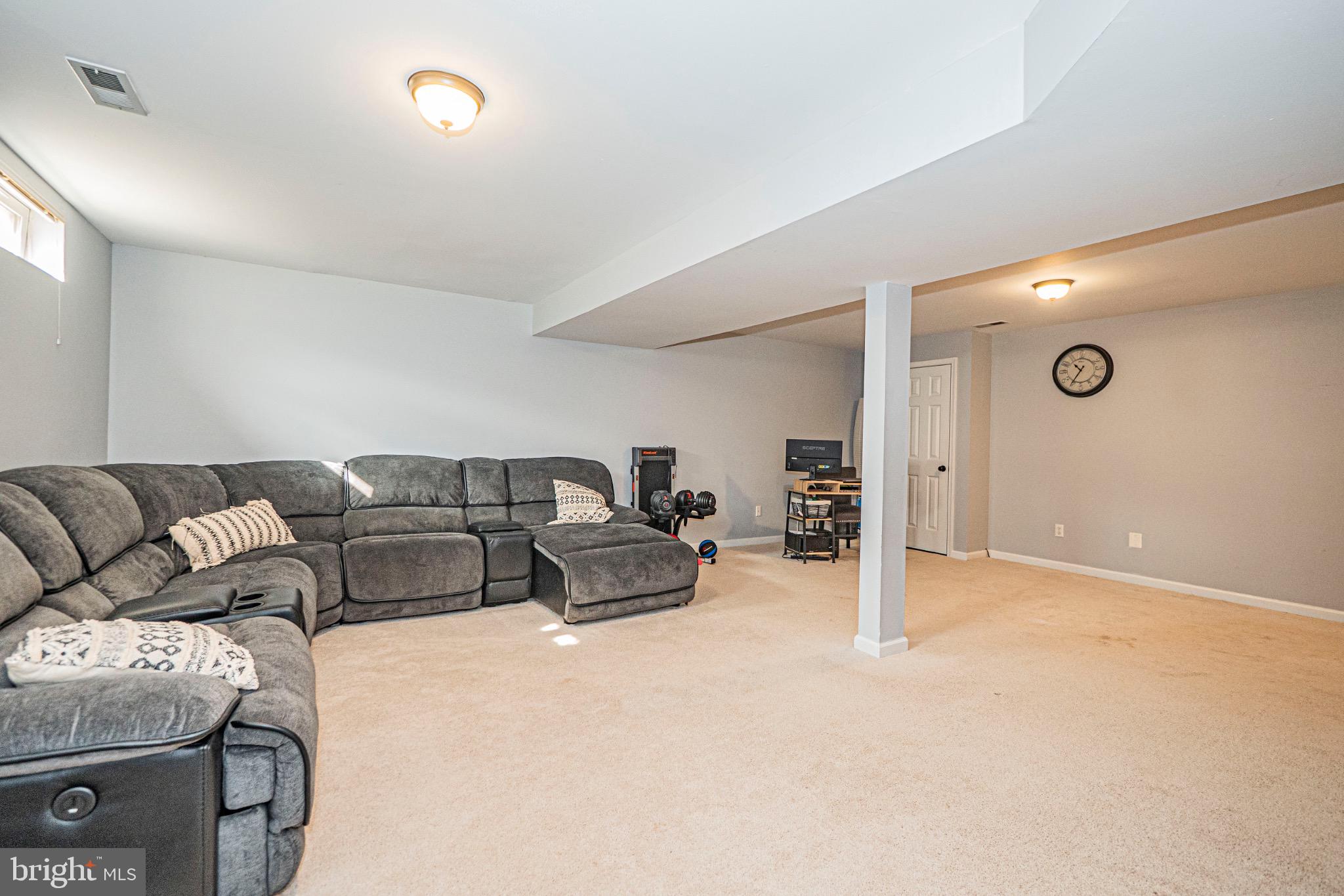405 McClellan Drive Frederick, MD 21702 - Photo 33 of 39 a living room with furniture