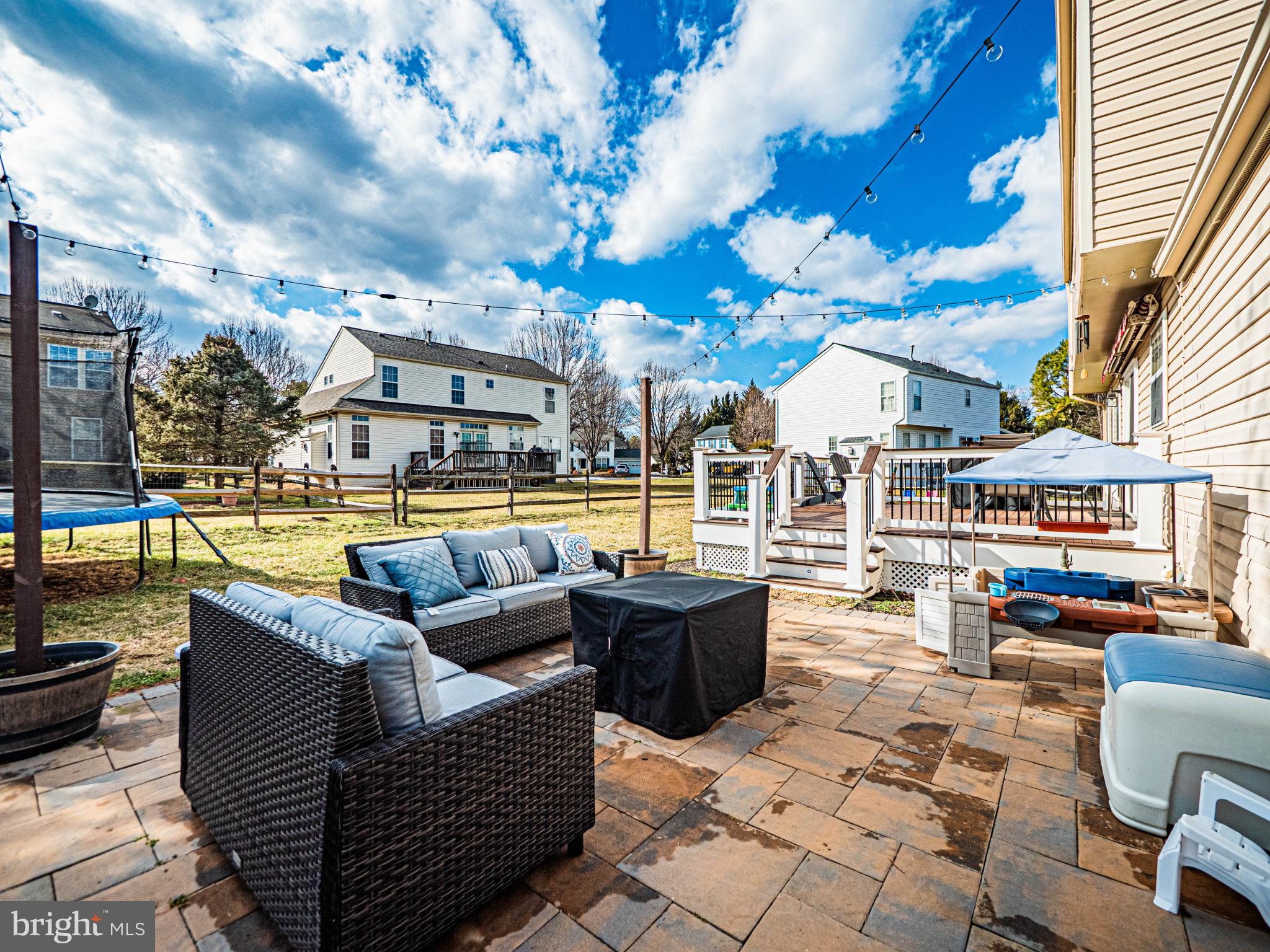 405 McClellan Drive Frederick, MD 21702 - Photo 35 of 39 a view of a swimming pool with outdoor seating