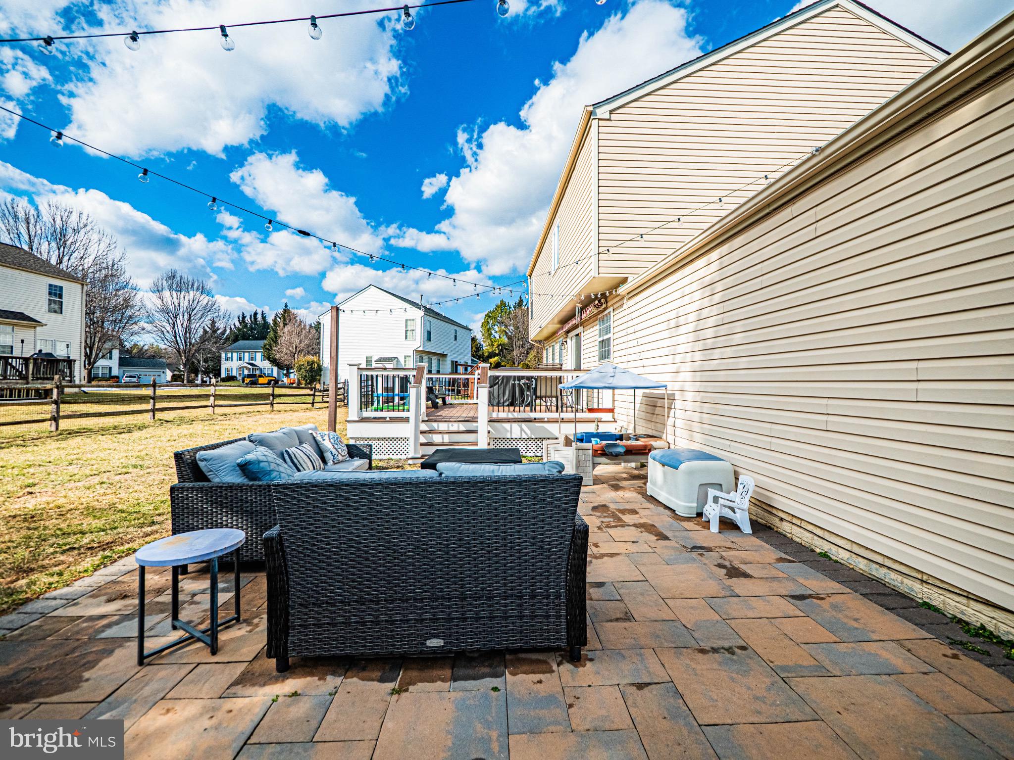 405 McClellan Drive Frederick, MD 21702 - Photo 39 of 39 a view of a patio with swimming pool and sitting area