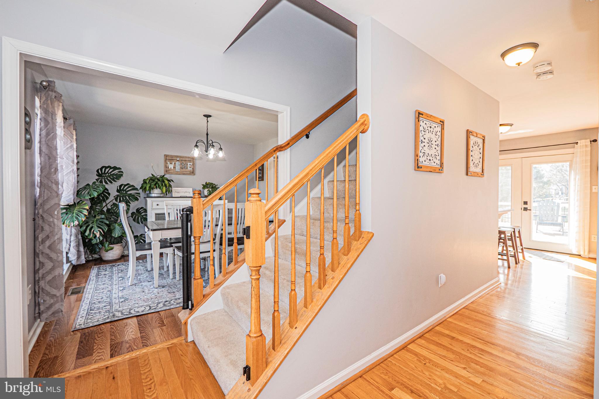 405 McClellan Drive Frederick, MD 21702 - Photo 4 of 39 a view of entryway and hall with wooden floor