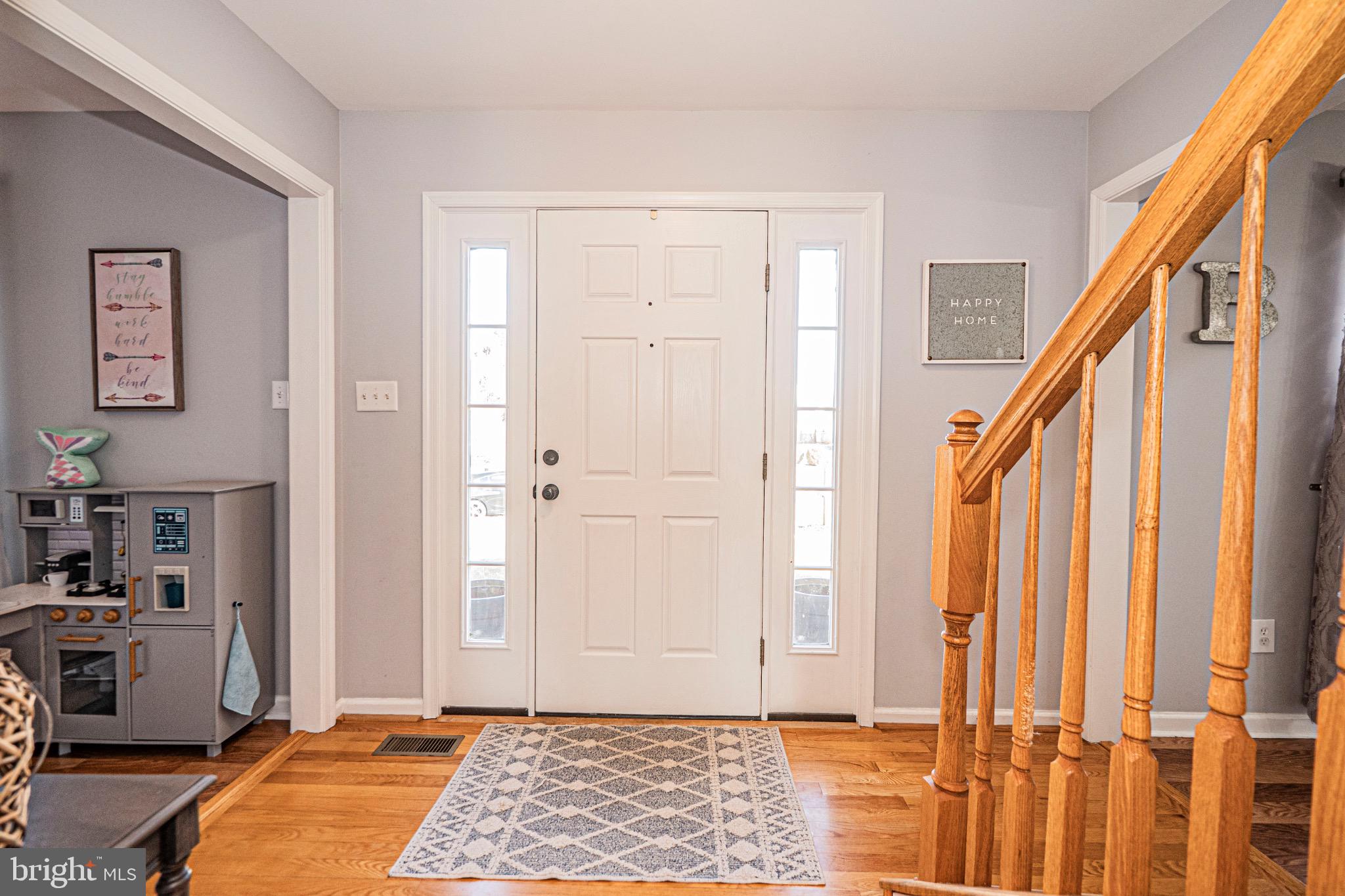 405 McClellan Drive Frederick, MD 21702 - Photo 6 of 39 a view of an entryway with staircase