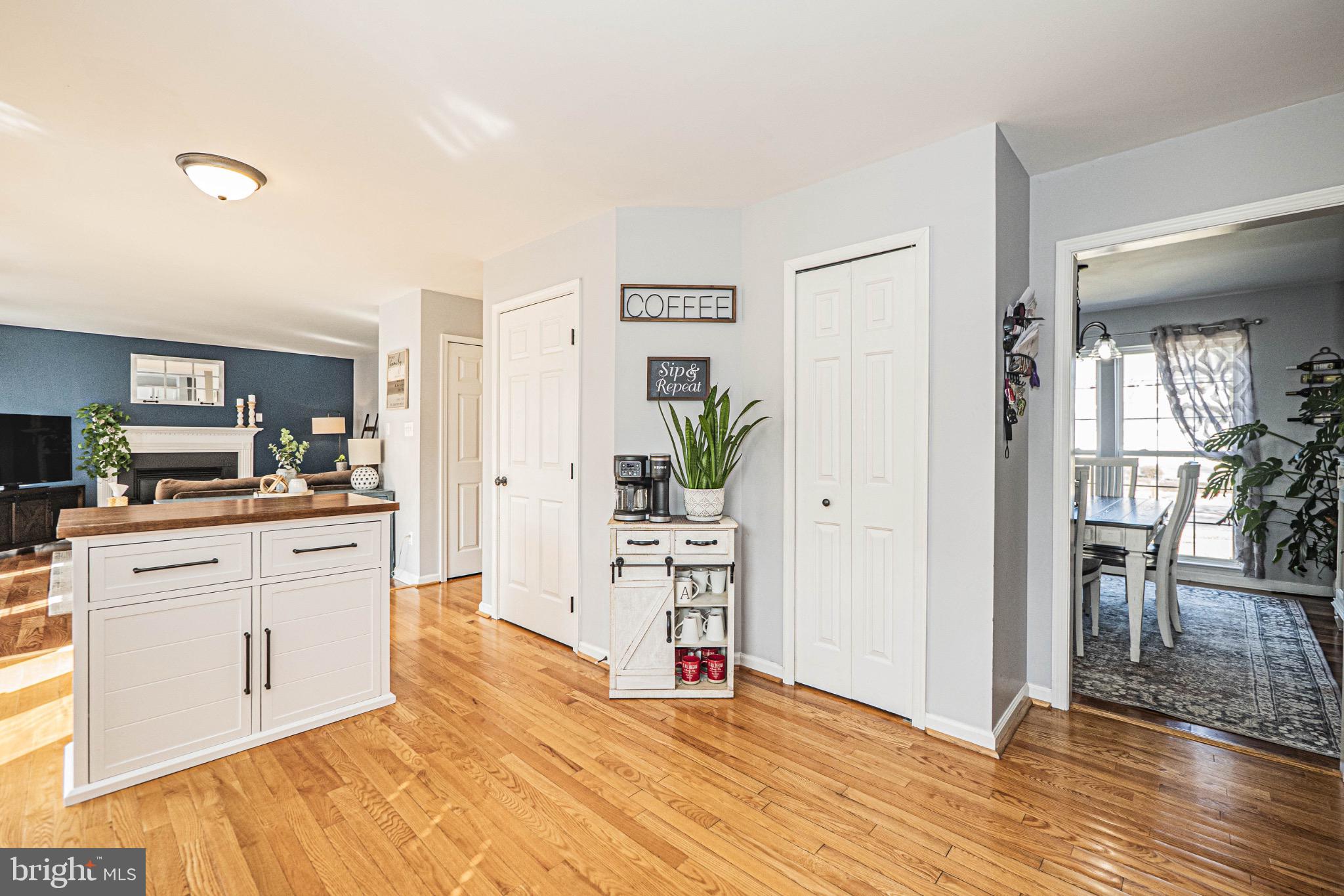 405 McClellan Drive Frederick, MD 21702 - Photo 10 of 39 a room with kitchen island and stainless steel appliances