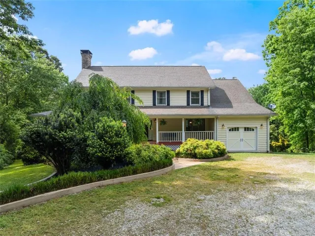 a kitchen with sink a stove and cabinets