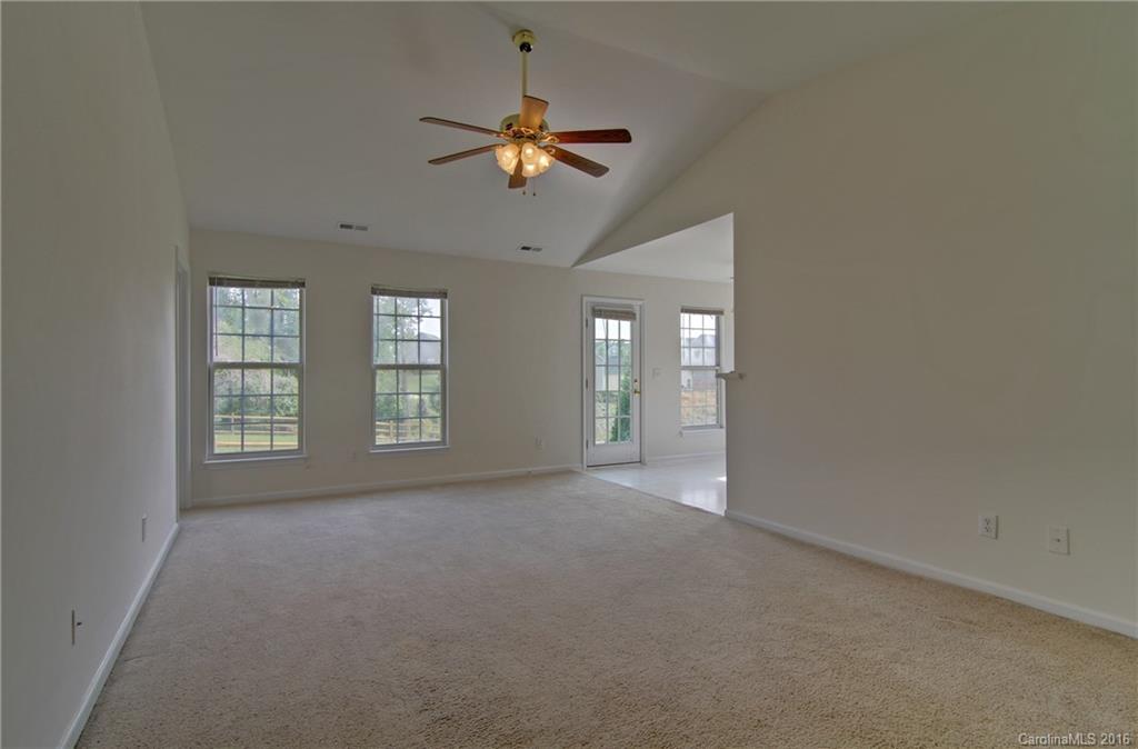 213 Grayland Road Mooresville, NC 28115 - Photo 2 of 15 a view of an empty room with a window