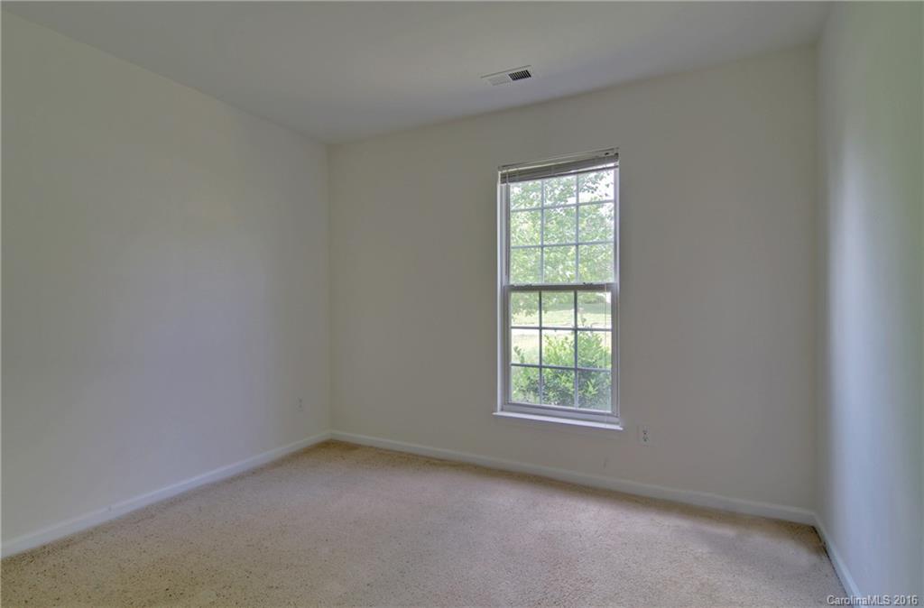 213 Grayland Road Mooresville, NC 28115 - Photo 10 of 15 an empty room with a window
