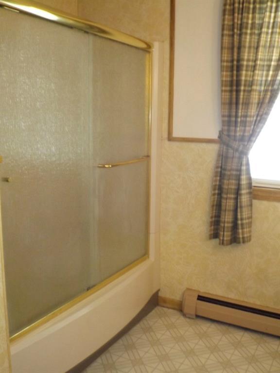 234 Kidder Hill Road Holden, ME 04429 - Photo 21 of 35 Hallway bath has full tub/shower.